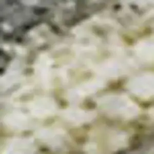 Photo of Taupe Brown And Gray Abstract Washable Area Rug With UV Protection