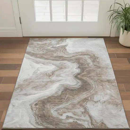 Taupe Brown And Ivory Abstract Washable Area Rug With UV Protection Photo 2