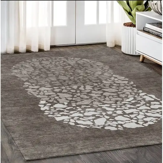 Taupe Brown And Ivory Abstract Washable Indoor Outdoor Area Rug Photo 9