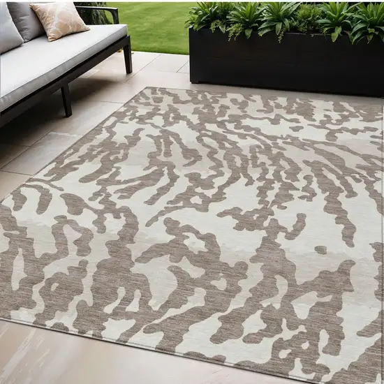 Taupe Brown And Ivory Animal Print Washable Indoor Outdoor Area Rug Photo 1