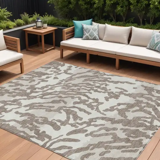 Taupe Brown And Ivory Animal Print Washable Indoor Outdoor Area Rug Photo 1