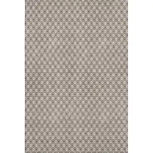 Photo of Taupe Brown And Ivory Geometric Washable Area Rug With UV Protection