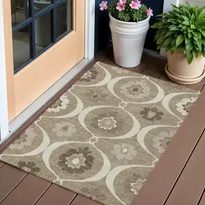 Photo of Taupe Brown And Ivory Medallion Washable Indoor Outdoor Area Rug