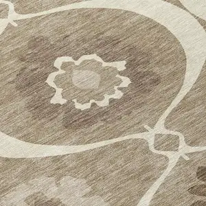 Photo of Taupe Brown And Ivory Medallion Washable Indoor Outdoor Area Rug