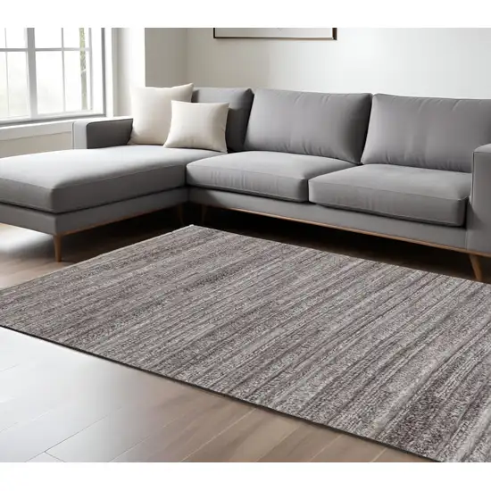 Taupe Brown And Ivory Striped Hand Woven Stain Resistant Area Rug Photo 1