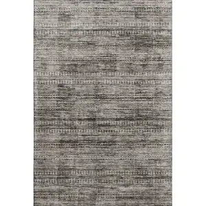 Photo of Taupe Brown And Ivory Striped Washable Area Rug With UV Protection