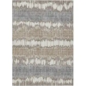 Photo of Taupe Brown And Ivory Striped Washable Indoor Outdoor Area Rug