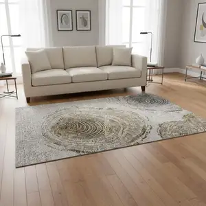 Photo of Taupe Brown And Ivory Woodland Lodge Washable Area Rug With UV Protection