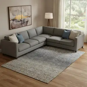 Photo of Taupe Charcoal And Gray Abstract Washable Area Rug With UV Protection