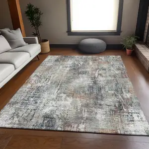 Photo of Taupe Copper And Beige Abstract Washable Area Rug With UV Protection