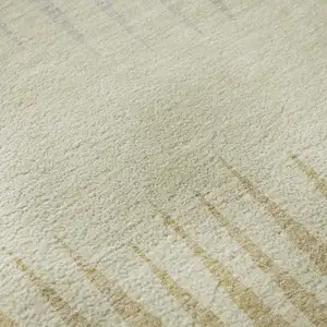 Photo of Taupe Gold And Beige Striped Washable Area Rug With UV Protection