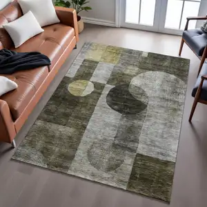 Photo of Taupe Gold And Brown Geometric Washable Area Rug With UV Protection