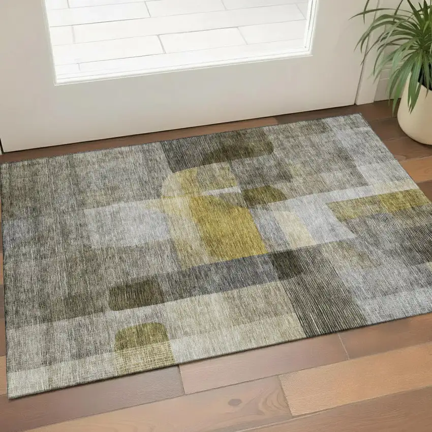 Taupe Gold And Gray Abstract Washable Area Rug With UV Protection Photo 1