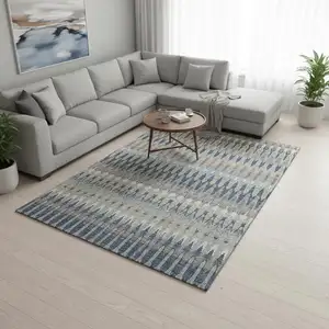 Photo of Taupe Gold And Gray Southwestern Washable Area Rug With UV Protection