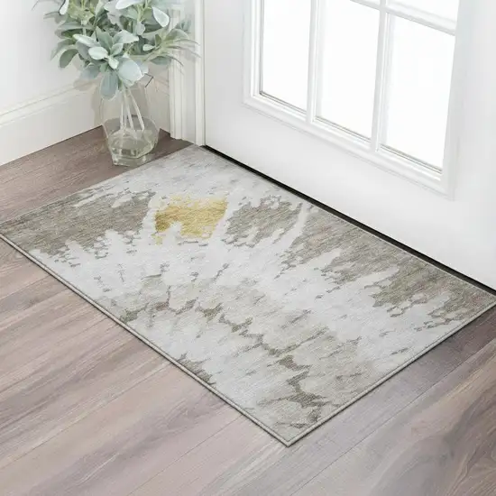 Taupe Gold And Ivory Abstract Washable Area Rug With UV Protection Photo 2