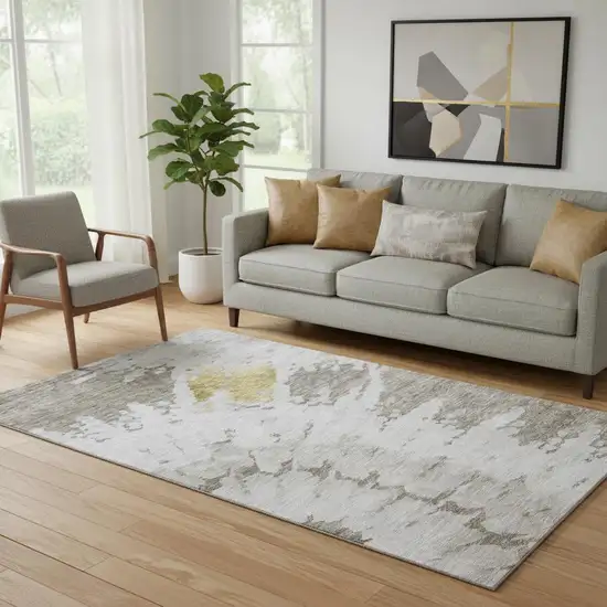 Taupe Gold And Ivory Abstract Washable Area Rug With UV Protection Photo 1