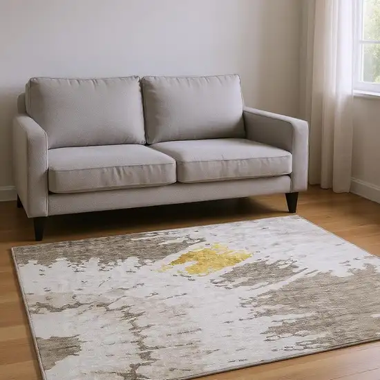 Taupe Gold And Ivory Abstract Washable Area Rug With UV Protection Photo 2