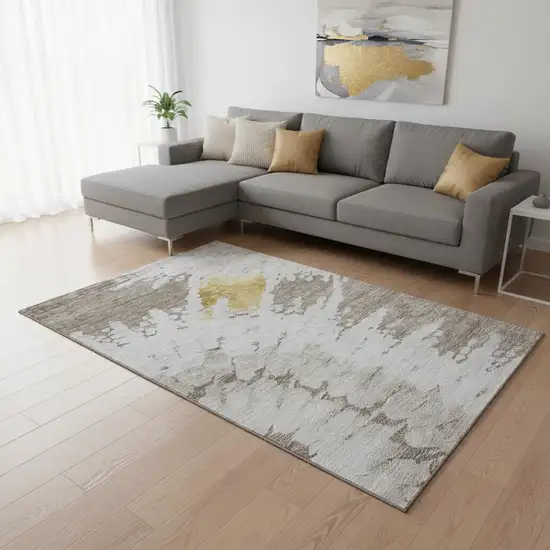 Taupe Gold And Ivory Abstract Washable Area Rug With UV Protection Photo 2