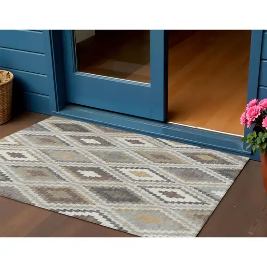 Taupe Gold And Ivory Geometric Washable Indoor Outdoor Area Rug Photo 1