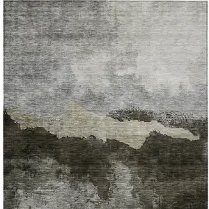 Photo of Taupe Gray And Black Abstract Washable Indoor Outdoor Area Rug