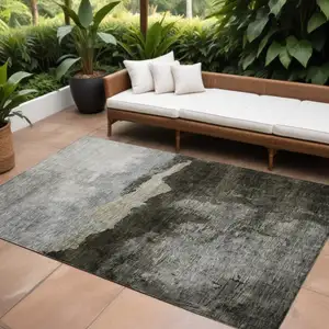 Photo of Taupe Gray And Black Abstract Washable Indoor Outdoor Area Rug