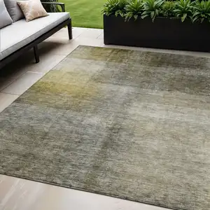 Photo of Taupe Gray And Black Abstract Washable Indoor Outdoor Area Rug