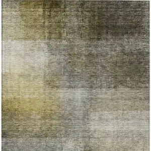 Photo of Taupe Gray And Black Abstract Washable Indoor Outdoor Area Rug