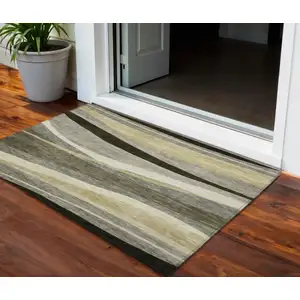 Photo of Taupe Gray And Black Abstract Washable Indoor Outdoor Area Rug