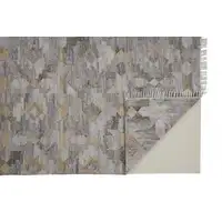 Photo of Taupe Gray And Blue Geometric Hand Woven Stain Resistant Area Rug With Fringe