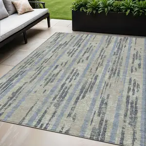 Photo of Taupe Gray And Blue Striped Washable Indoor Outdoor Area Rug