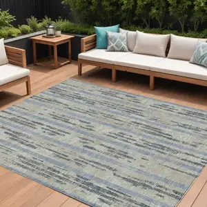 Photo of Taupe Gray And Blue Striped Washable Indoor Outdoor Area Rug