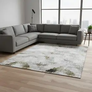 Photo of Taupe Gray And Brown Abstract Washable Area Rug With UV Protection