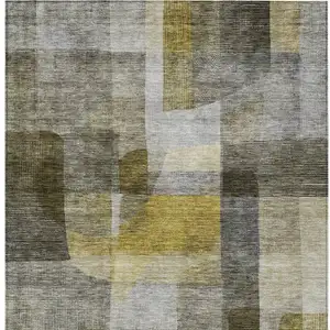 Photo of Taupe Gray And Green Abstract Washable Indoor Outdoor Area Rug
