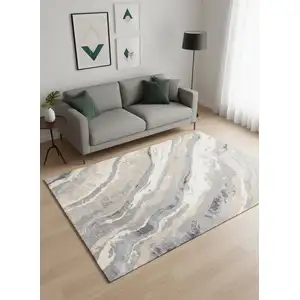 Photo of Taupe Gray And Ivory Abstract Area Rug