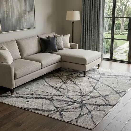Taupe Gray And Ivory Abstract Stain Resistant Area Rug Photo 1