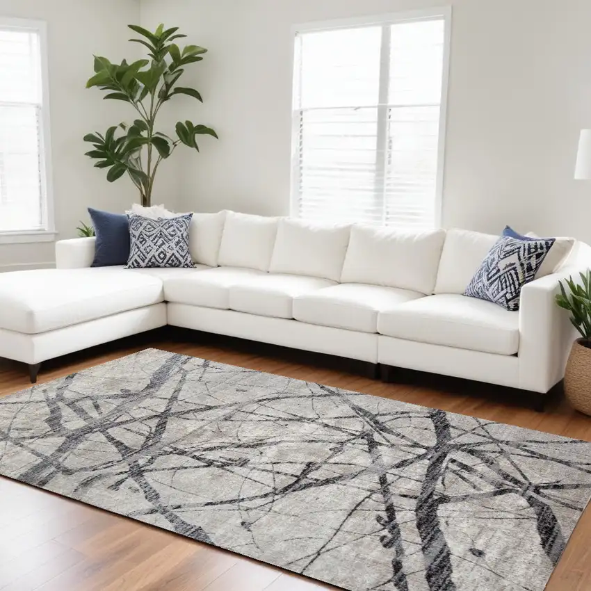 Taupe Gray And Ivory Abstract Stain Resistant Area Rug Photo 1