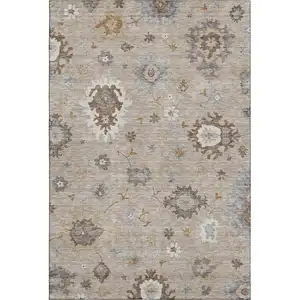 Photo of Taupe Gray And Ivory Floral Medallion Washable Area Rug With UV Protection