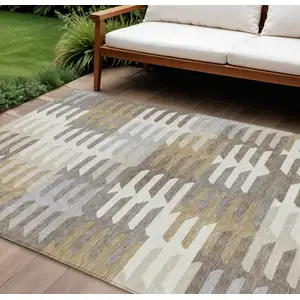 Photo of Taupe Gray And Ivory Geometric Washable Indoor Outdoor Area Rug