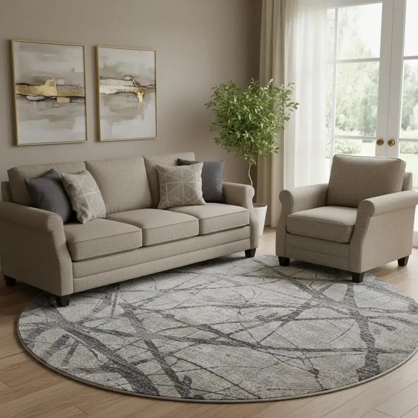 9' Gray And Ivory Abstract Round Rug Photo 1