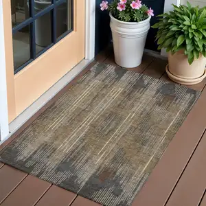 Photo of Taupe Gray And Ivory Striped Washable Indoor Outdoor Area Rug