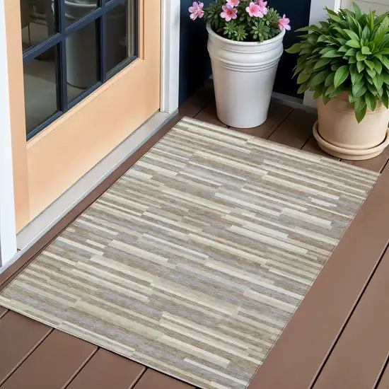 Taupe Gray And Ivory Striped Washable Indoor Outdoor Area Rug Photo 1