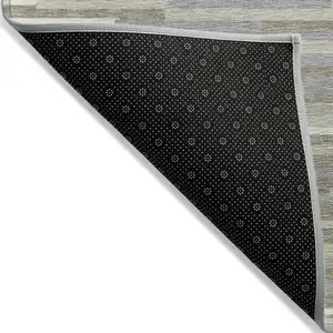 Photo of Taupe Gray And Ivory Striped Washable Indoor Outdoor Area Rug