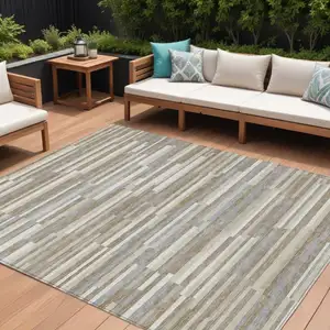 Photo of Taupe Gray And Ivory Striped Washable Indoor Outdoor Area Rug