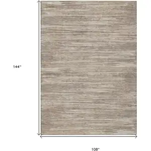 Photo of Taupe Gray And Ivory Striped Washable Indoor Outdoor Area Rug