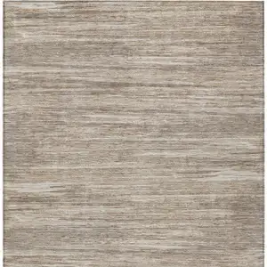 Photo of Taupe Gray And Ivory Striped Washable Indoor Outdoor Area Rug