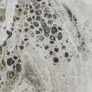 Photo of Taupe Gray And Silver Abstract Washable Area Rug With UV Protection