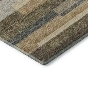 Photo of Taupe Gray And Silver Striped Washable Area Rug With UV Protection