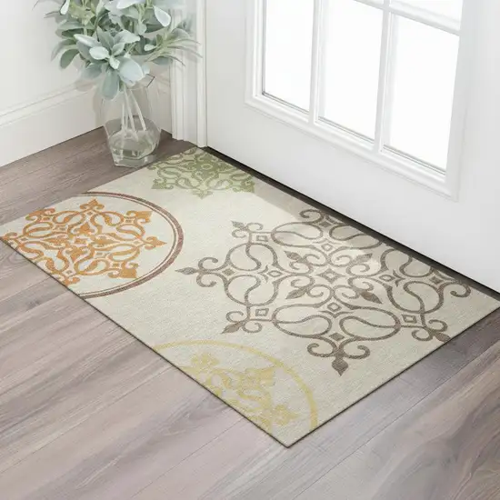 Taupe Green And Copper Floral Medallion Washable Area Rug With UV Protection Photo 1
