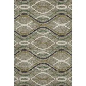 Photo of Taupe Green And Gold Abstract Washable Area Rug With UV Protection