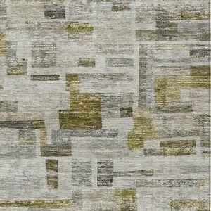 Photo of Taupe Green And Gray Striped Washable Indoor Outdoor Area Rug